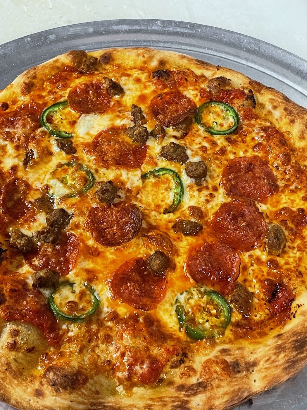 Pin Seeker hand-tossed pizza